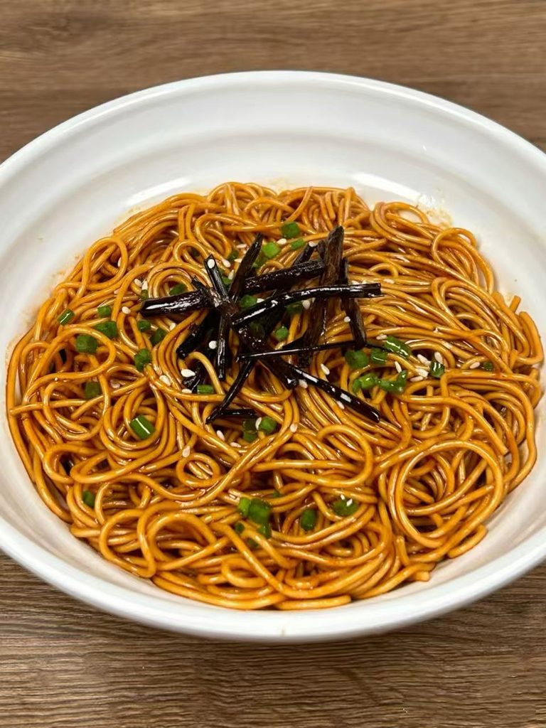 Shanghai scallion oil noodles tossed with fragrant scallion oil and soy-based seasoning
